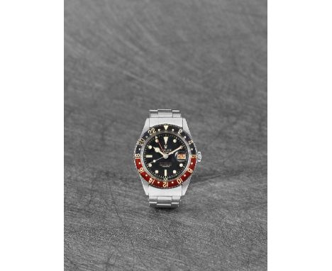 Rolex. A very fine and exceptionally rare stainless steel automatic dual time calendar wristwatch with bakelite bezel GMT-Mas