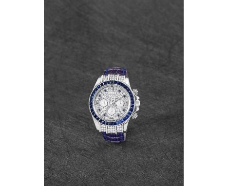 Rolex. An exceptionally fine and rare 18K white gold diamond and sapphire set automatic chronograph wristwatchModel: Cosmogra
