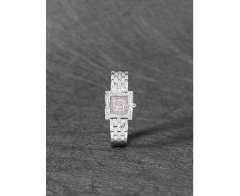 Patek Philippe. A lady's fine 18K white gold, diamond set quartz bracelet watch with mother of pearl dialModel: GondoloRefere