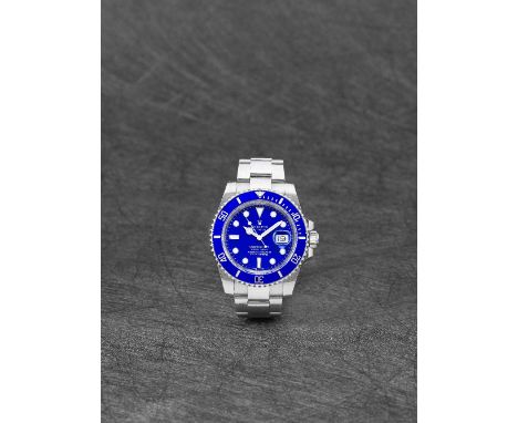 Rolex. A fine 18K white gold automatic calendar bracelet watchModel: Submariner 'Smurf'Reference: 116619LBDate: Purchased 12t