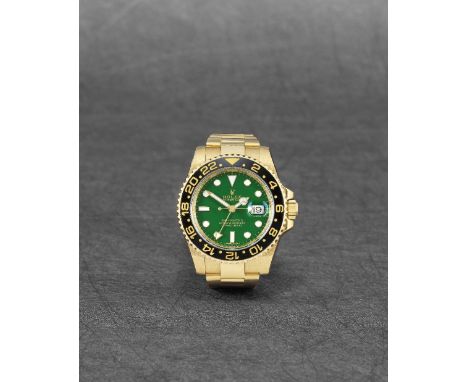 Rolex. A fine 18K gold automatic calendar bracelet watch with dual time zoneModel: GMT-Master IIReference: 116718LNDate: Purc