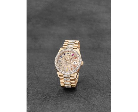 Rolex. An extremely fine and rare 18K rose gold diamond and sapphire set automatic calendar bracelet watchModel: Day-Date Rai