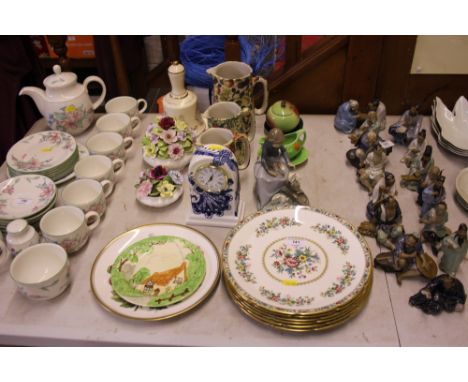 Six Coalport Ming rose plates; together with a Nao figurine, a Coalport commemorative china hand bell, two floral encrusted o