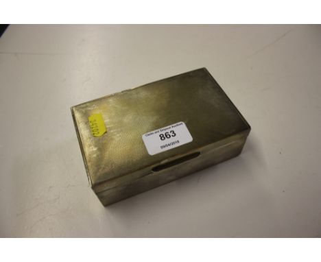A modern silver cigarette box with engine turned decoration 