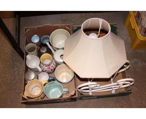 Two boxes containing a wrought iron magazine rack; a table lamp and various vases and jugs etc.