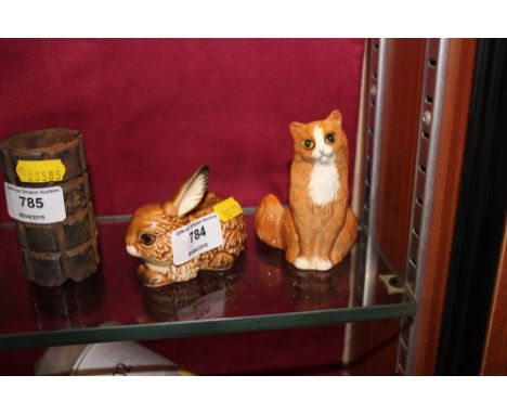 A Royal Doulton cat ornament; together with a Goebel rabbit