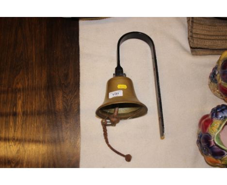 A brass bell - possibly from a fire engine