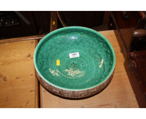 A Poole pottery green and brown glazed bowl