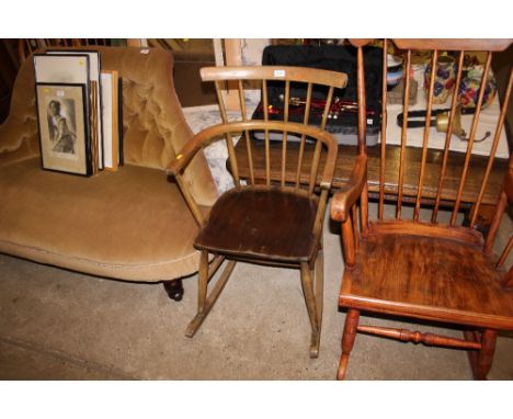 An Ercol style stick back rocking chair