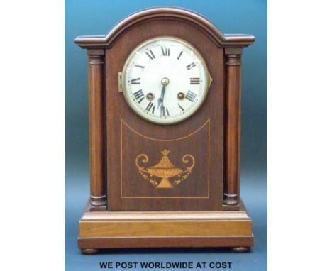 Edwardian mahogany cased mantle clock with french twin train movement, the dome toped case with columns and inlaid decoration