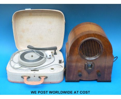 A vintage Deco wooden cased radio, together with a portable record player by Baird 