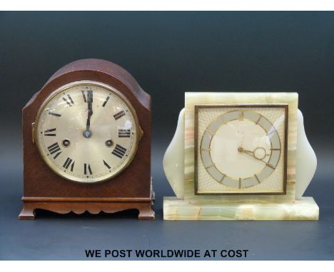 A two train Wurttemberg mantel clock and a Kenzle modern onyx mantle clock with moon hands