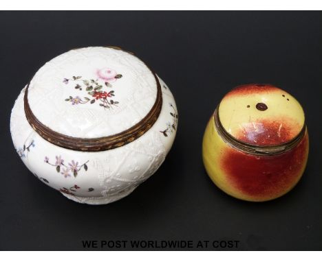 An unusual 18thC enamel patch box of baluster form with relief moulded and floral decoration together with another enamel pil