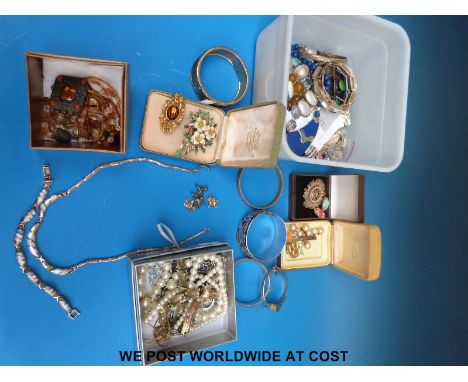 A collection of costume jewellery, also includes silver bangle, silver bracelet and necklace etc