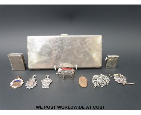 An Edward VII hallmarked silver pin cushion, (length 4cm) hallmarked silver vesta, hallmarked silver and other sporting fobs,