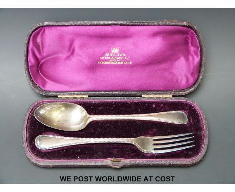 A Victorian hallmarked silver cased fork and spoon Ldn 1881 (68g)