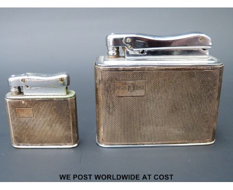 A hallmarked silver Calibri Monopol  table lighter together with a smaller example