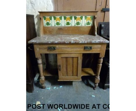 A marble-topped tile-backed washstand (W100 x D46 x H108cm)