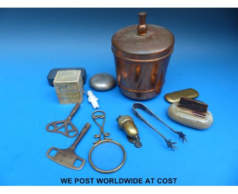A metal 1953 Coronation tea caddy containing a quantity of objets de vertu including snuff boxes, magnifier, miniature items,