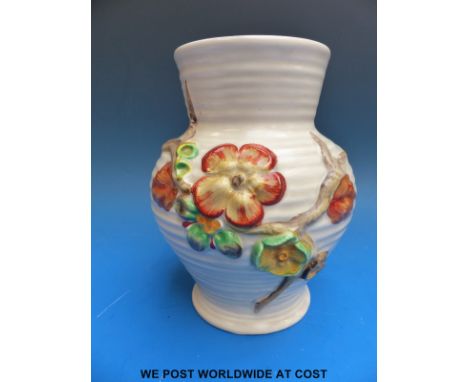 A Clarice Cliff relief moulded vase (shape no 912) with Newport Pottery stamp to base (17.5cm tall)