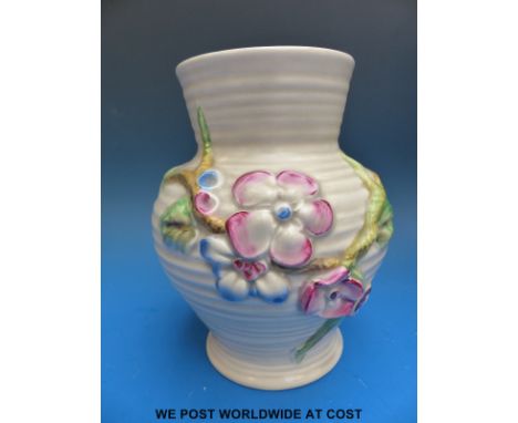 A Clarice Cliff relief moulded vase (shape no 912) with Newport Pottery stamp to base (17.5cm tall)