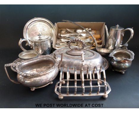 A quantity of silver plated items to include teaware, salver, large ladle and various cutlery etc