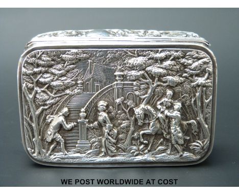 A Victorian hallmarked silver table top snuff or trinket box with gilt interior and scene of two courting couples, one couple