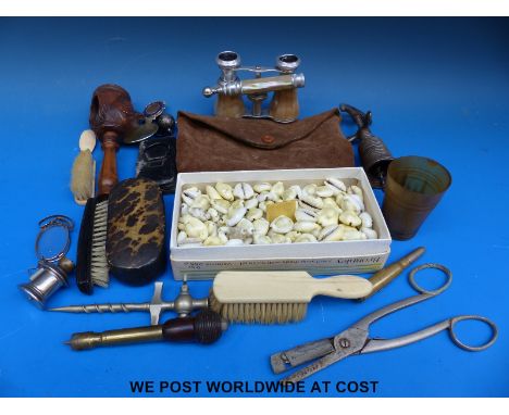 Mixed items including a black forest nutcracker box of small cowrie shells, lorgnette, trench art, niello ball, Winsor and Ne