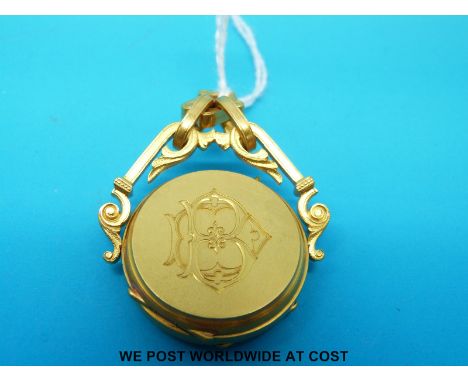 An exceptional 18ct gold swivel fob comprising a thermometer and compass of full hunter form, each side operated by its own p