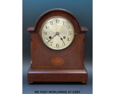 A mahogany cased two train mantel clock, steel dial, Arabic numerals, inlaid decoration to case, steel blue spade hands the W