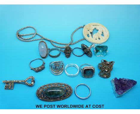 Ten silver rings set with marcasite, rose quartz etc, silver necklace, two silver brooches and an amethyst geode made into a 