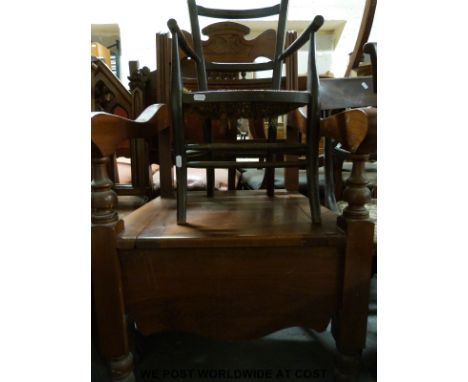 A late 19thC carved mahogany commode