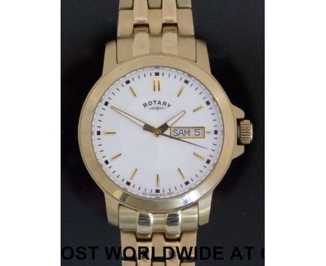Rotary Windsor gentleman's wristwatch with day and date apertures, luminous hands and gold markers, in gold plated case, on m