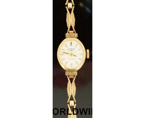 Rotary 9ct gold ladies wristwatch with two tone hands and markers, on pierced bracelet, case size 14x17mm, 9g, in original bo