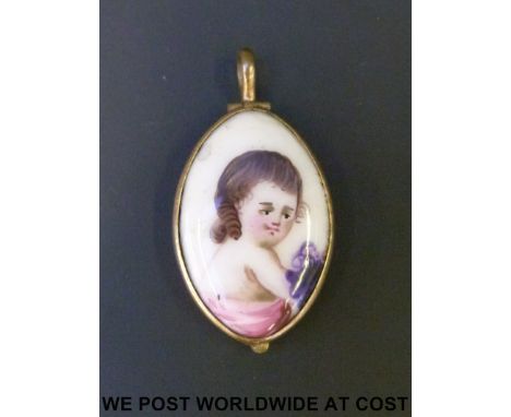 An 18thC enamel portrait locket decorated with an infant girl, the hinged back a magnifying glass. 3.3 x 1.7cm