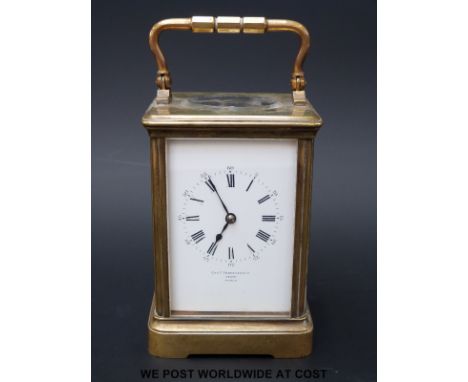 A brass carriage clock by Frodsham and Co, inscribed to dial and movement Chas. Frodsham & Co, Paris