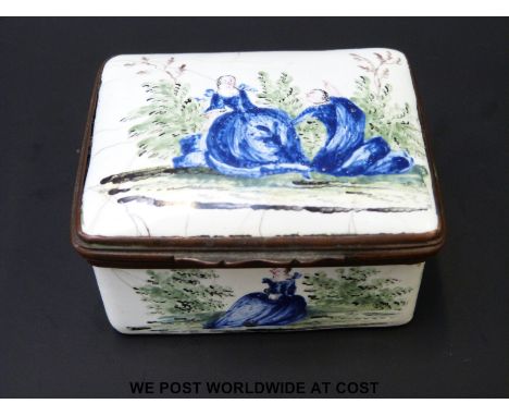A mid 18thC Bilston enamel patch box decorated with a man kneeling before a woman, the sides and interior of the lid decorate