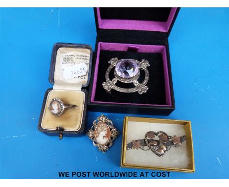 A hallmarked Scottish silver and amethyst brooch, silver and gold brooch etc