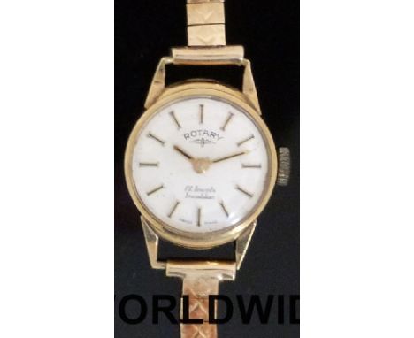 Rotary 9ct gold ladies wristwatch with gold hands and baton markers on silvered face, on 9ct gold bracelet, case diameter 16m