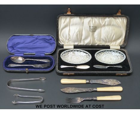 A cased Victorian hallmarked silver spoon and fork set (579g) Herbert Wolf cased cut glass butter dishes with hallmarked silv