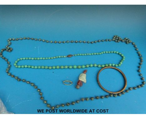 A beaded turquoise necklace, a Tibetan  turquoise necklace and matching bangle, a turquoise brooch and a camelian agate and t