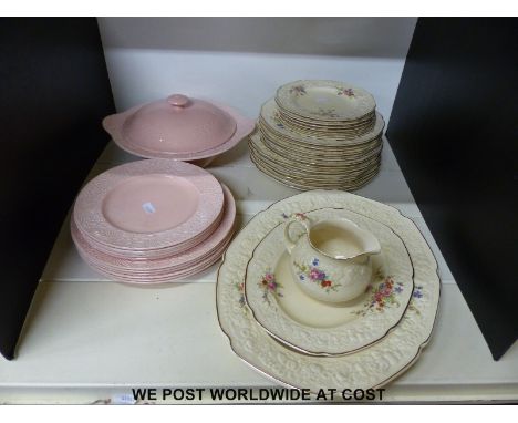 A collection of Clarice Cliff relief moulded plates and a tureen together with Crown Ducal plates, platter, jug etc