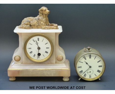 A 19thC alabaster clock with figural dog finial and a brass clock with subsidiary dial