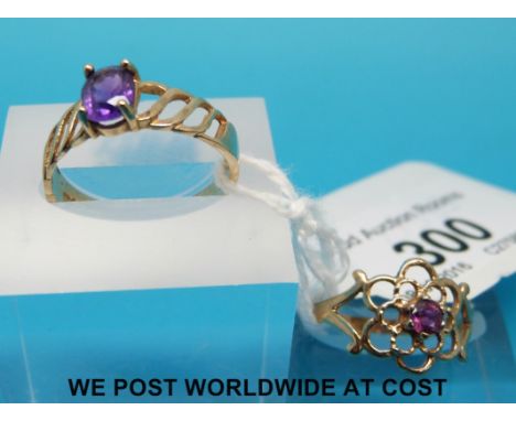 Two 9ct gold rings, one set with an amethyst the other a garnet 