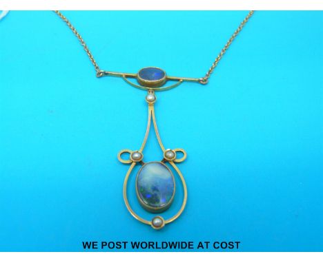 An Edwardian 9ct gold necklace set with two opal doublets and seed pearls 