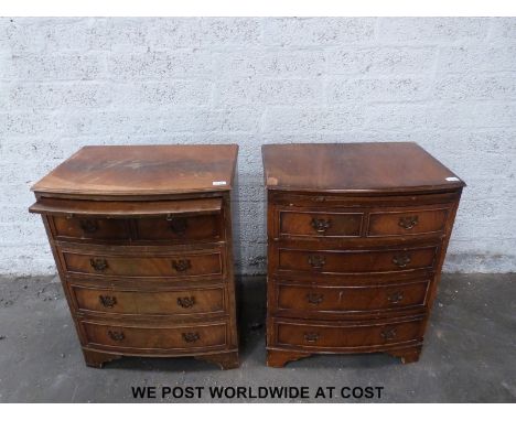 A pair of bow fronted chests of two over three drawers with brush slide and raised on bracket feet (W63 x D46 x H80cm)