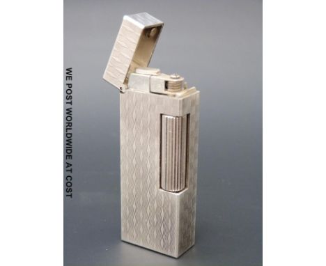 A silver hallmarked Dunhill Rollagas lighter London 1993 and stamped 925 to base