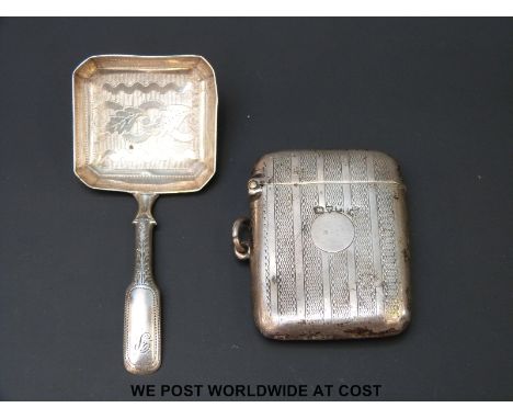 A Georgian hallmarked silver caddy spoon and a hallmarked silver vesta