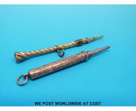 Two propelling pencils, one wrythen moulded with amethyst finial