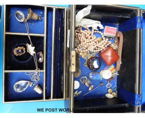 A collection of costume jewellery to include a hallmarked silver thimble and bell, hallmarked silver brooch set with agate an